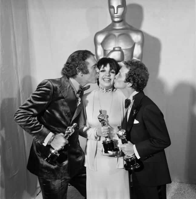 A trio of Oscar winners celebrate backstage in 1973: Producer Albert S. Ruddy (from left) for best picture ("The Godfather"), Liza Minnelli ("Cabaret") for best actress and Joel Grey ("Cabaret") for best supporting actor.