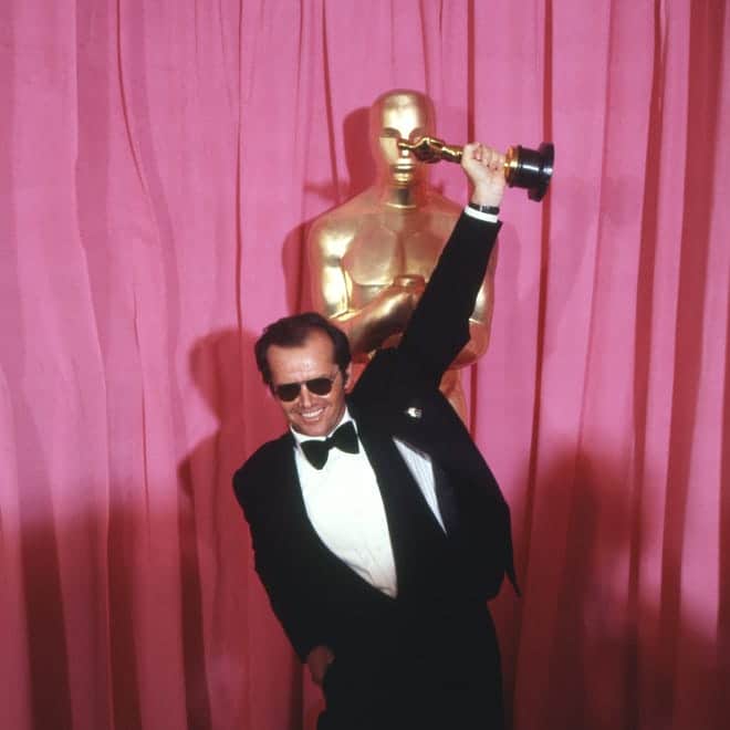 Jack Nicholson dons his shades and hoists his best actor Oscar (for "One Flew Over the Cuckoo's Nest") in 1976.