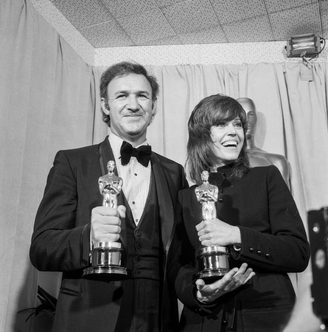 Best actor Gene Hackman ("The French Connection") and best actress Jane Fonda ("Klute") pose with their Oscars backstage in 1972.